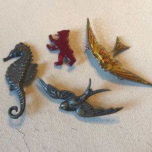 Animal brooches